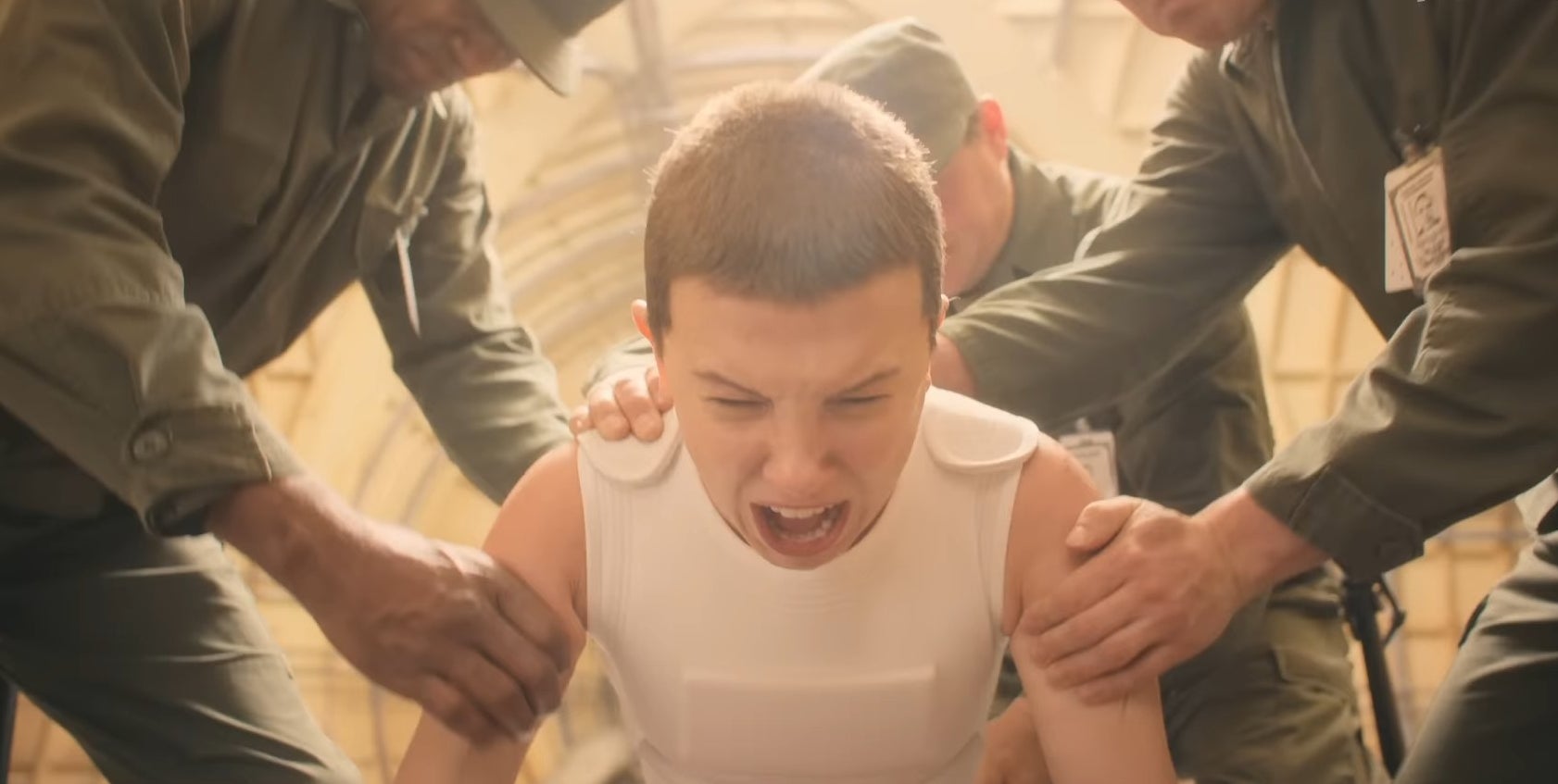 Eleven screaming as she&#x27;s held down by guards in &quot;Stranger Things&quot;