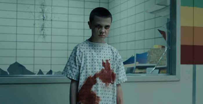 Eleven with blood on her smock and eyes in &quot;Stranger Things&quot;