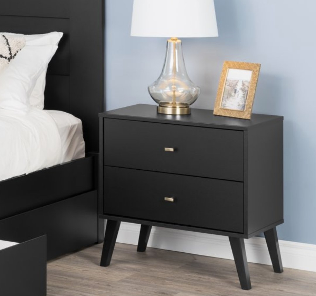 A black mid century modern nightstand