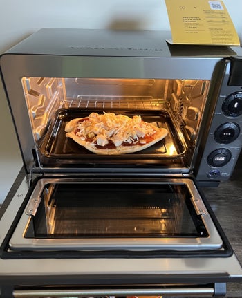Pizza in Tovala oven before cooking