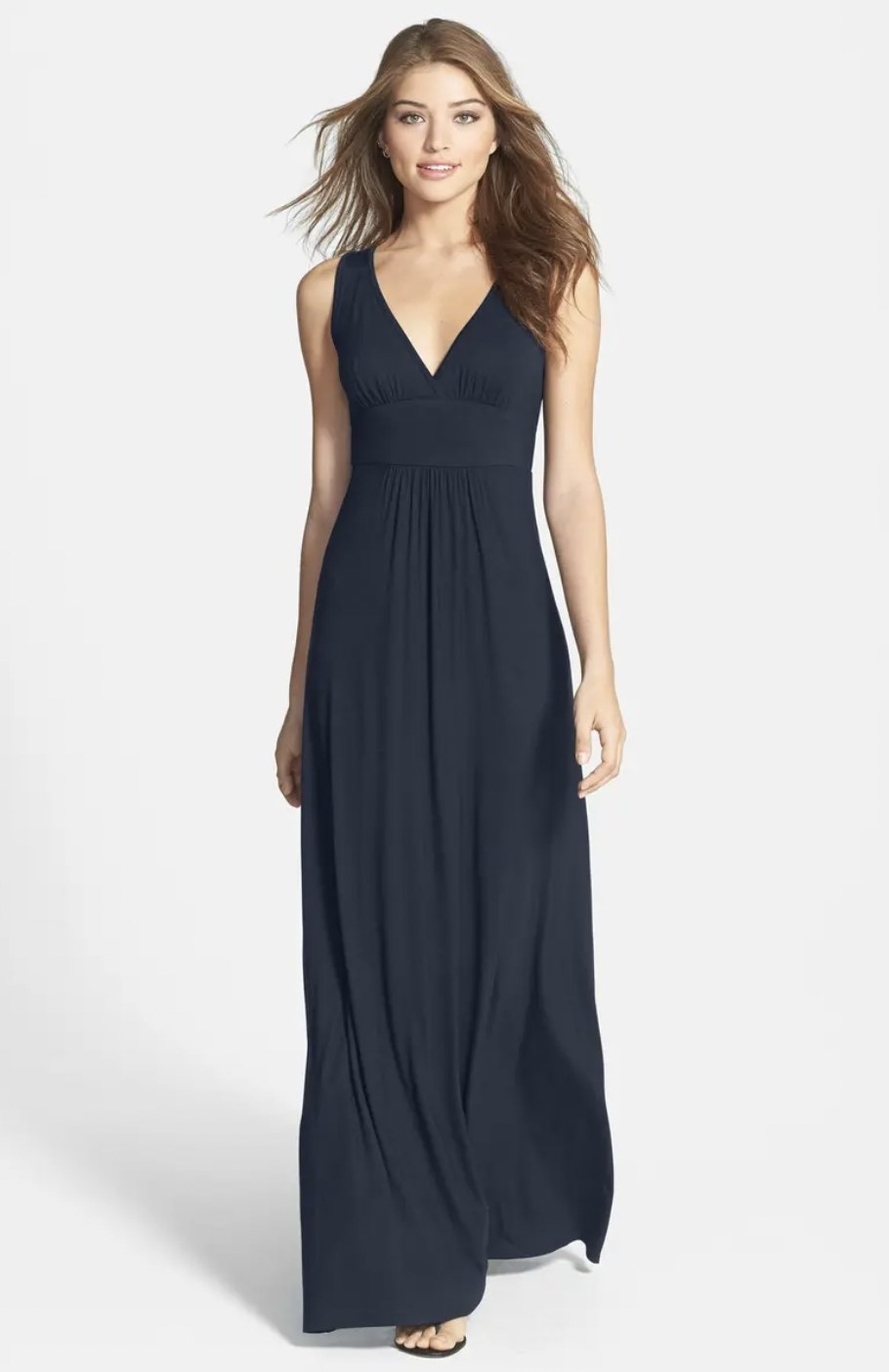 Model in the navy blue dress