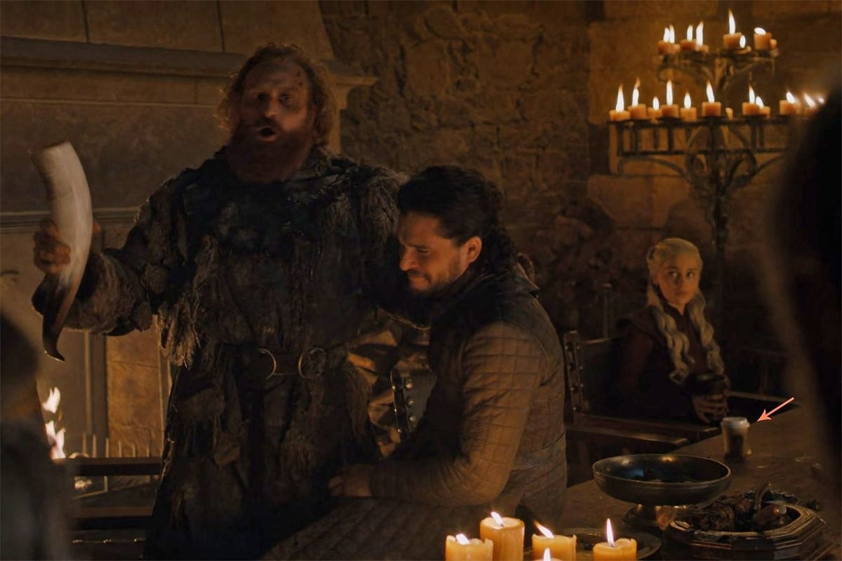 game of thrones scene with a starbucks cup in it