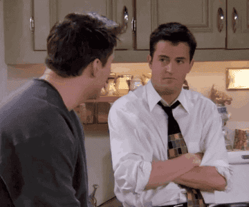 Matthew Perry as Chandler Bing laughs with Matt LeBlanc as Joey Tribbiani in &quot;Friends&quot;