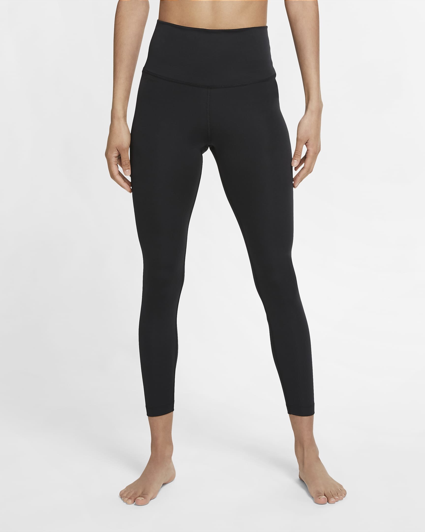 model in black yoga pants