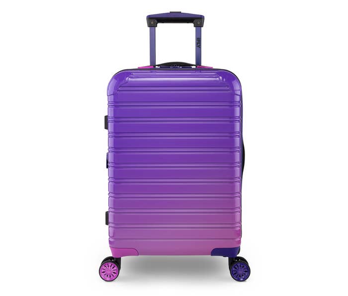 An image of a 20-inch midnight berry hard side luggage carry-on bag