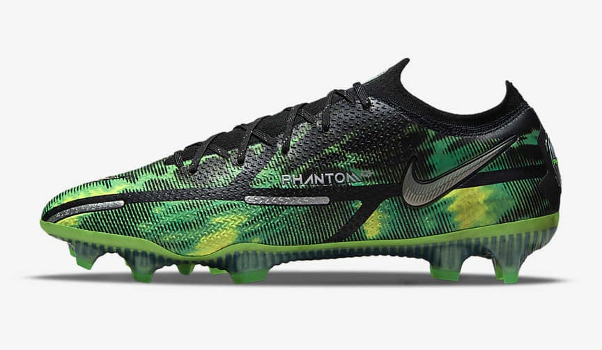 green and black swirly soccer cleats