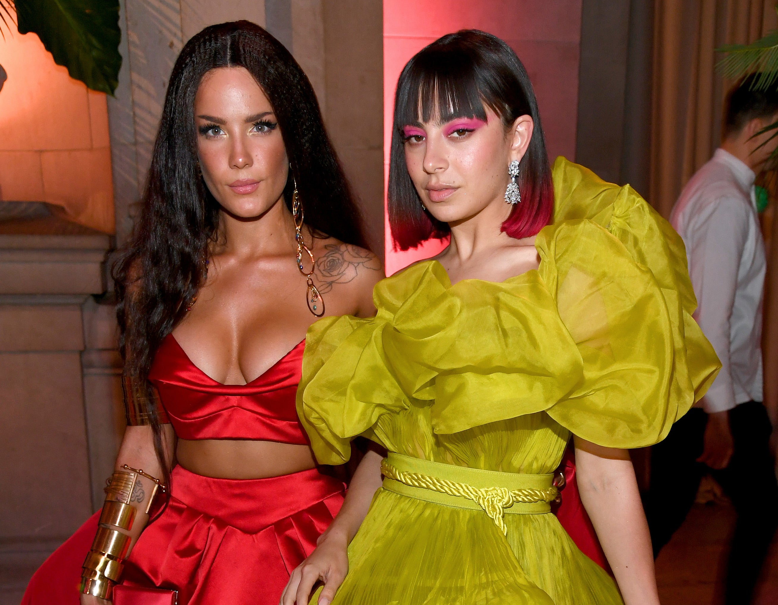 A closeup of Halsey and Charli XCX
