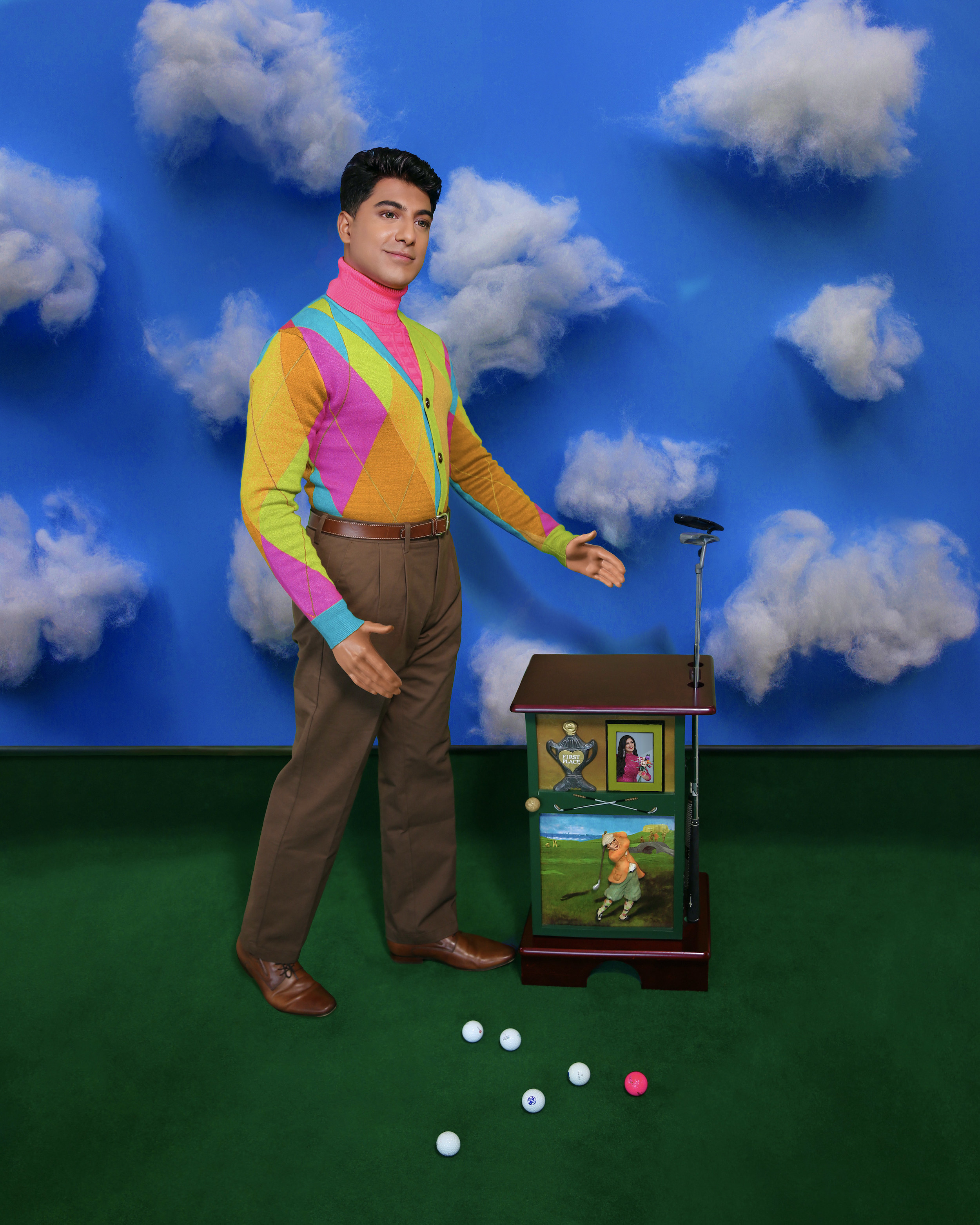 Ritesh art outside with clouds and green for golfing