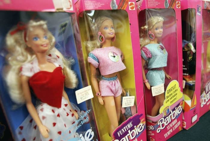 close up of Barbies on a store shelf