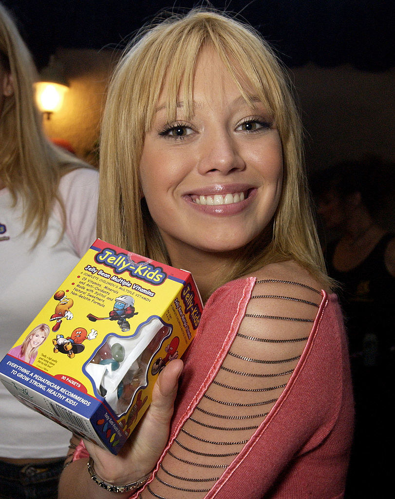 Hilary holding a box of Jelly-Kids multiple vitamins