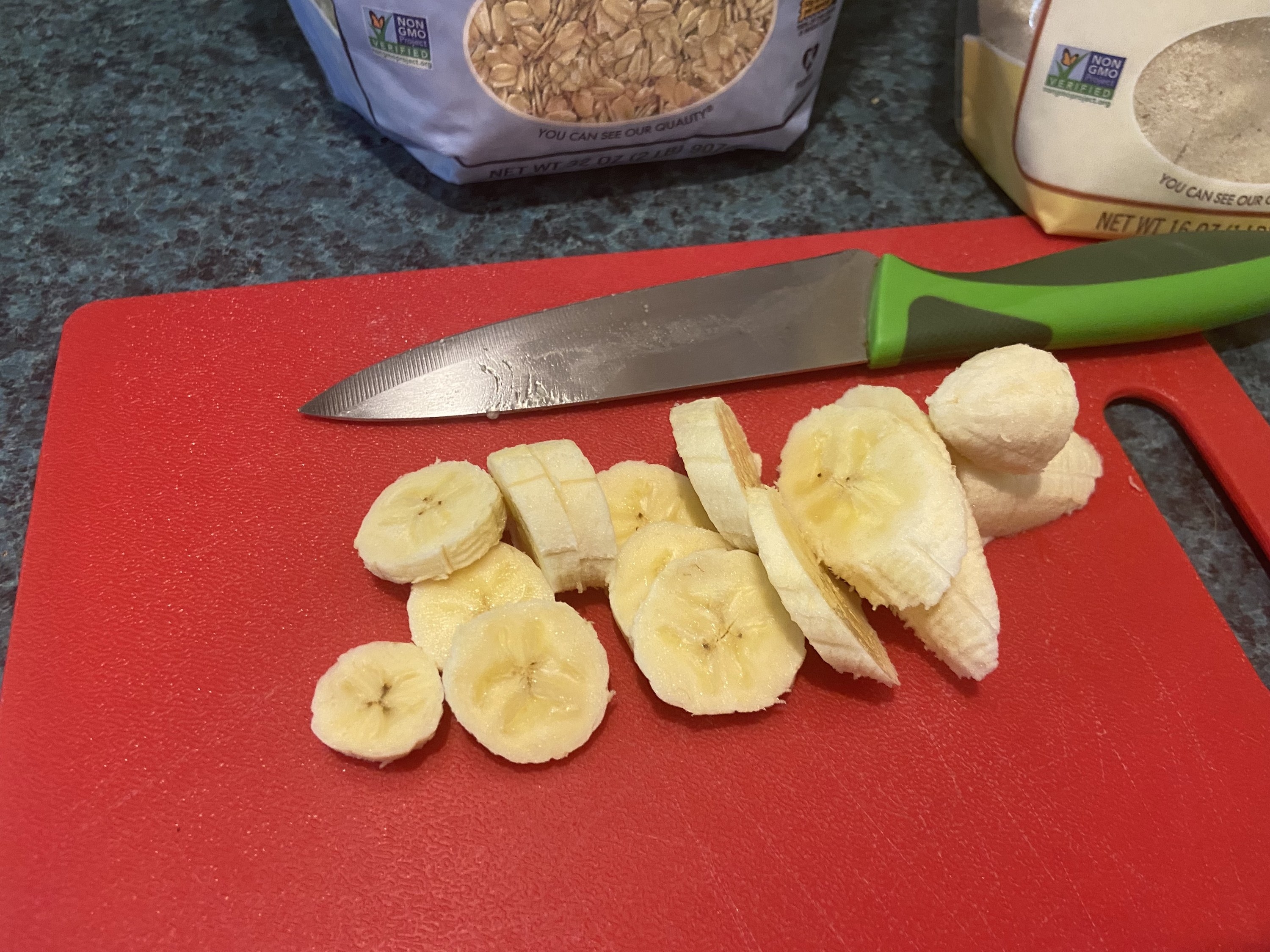 a sliced banana on a cutting board