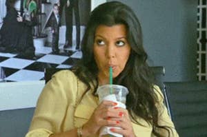 Kourtney Kardashian sipping on a Starbucks drink