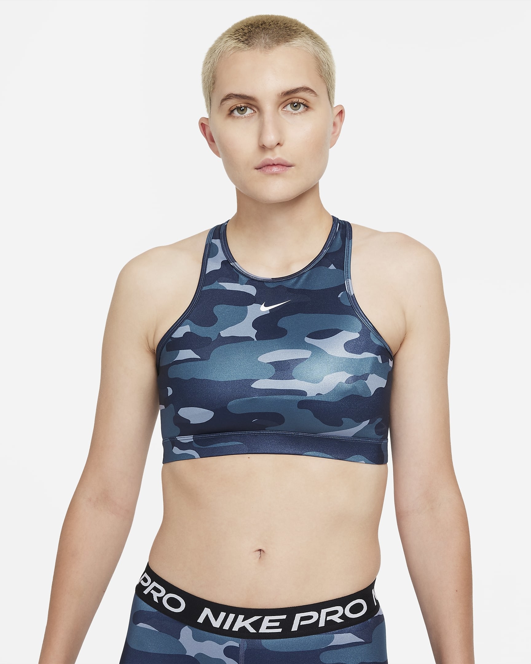 model in blue camouflage print high-neck sports bra