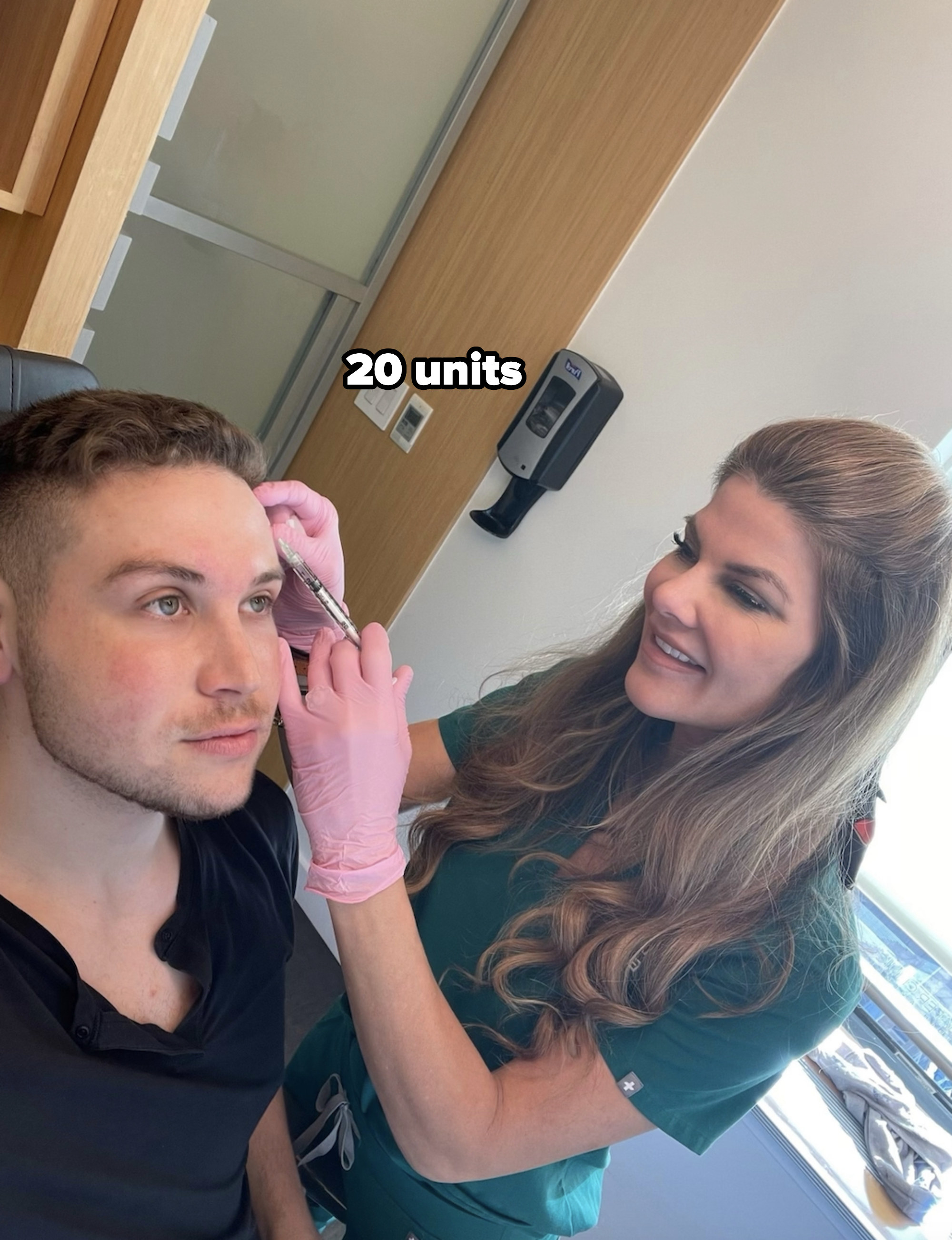 Dr Dendy applying Botox to Ryan with the text &quot;20 units&quot;