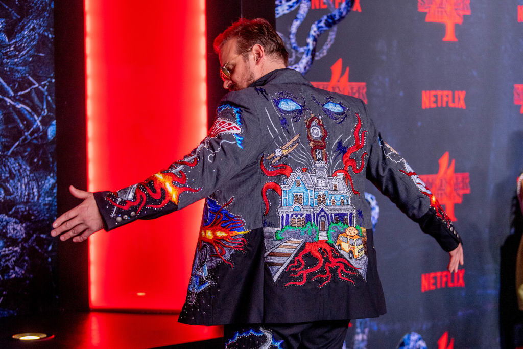 David Harbour showing the back of the jacket