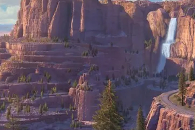 A cliff side with a waterfall