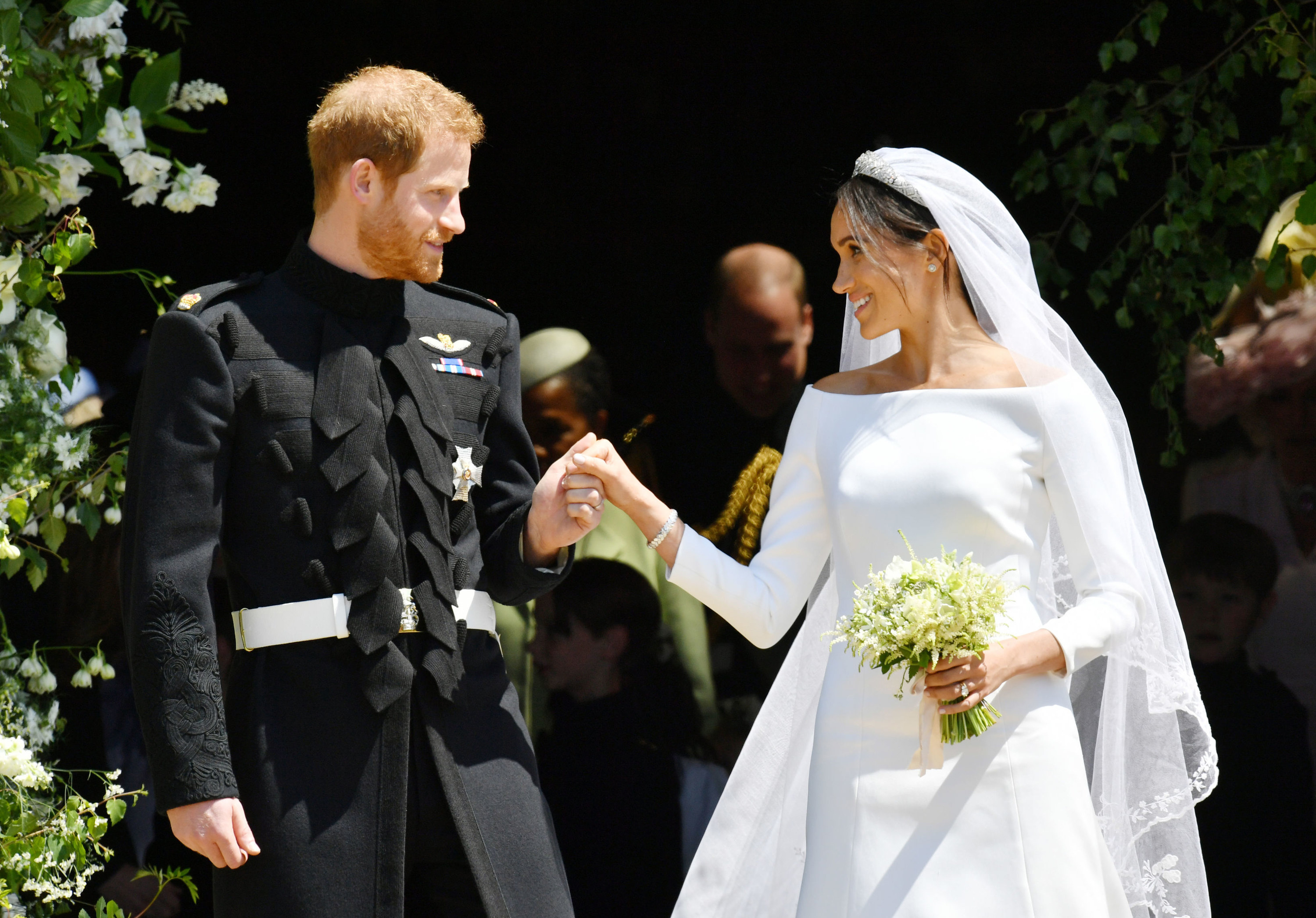 Prince Harry and Meghan Markle exit St. George&#x27;s Chapel after getting married in 2018