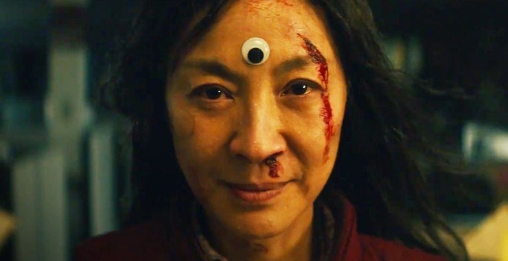 Michelle Yeoh as Evelyn with a googly eye in between her eyes