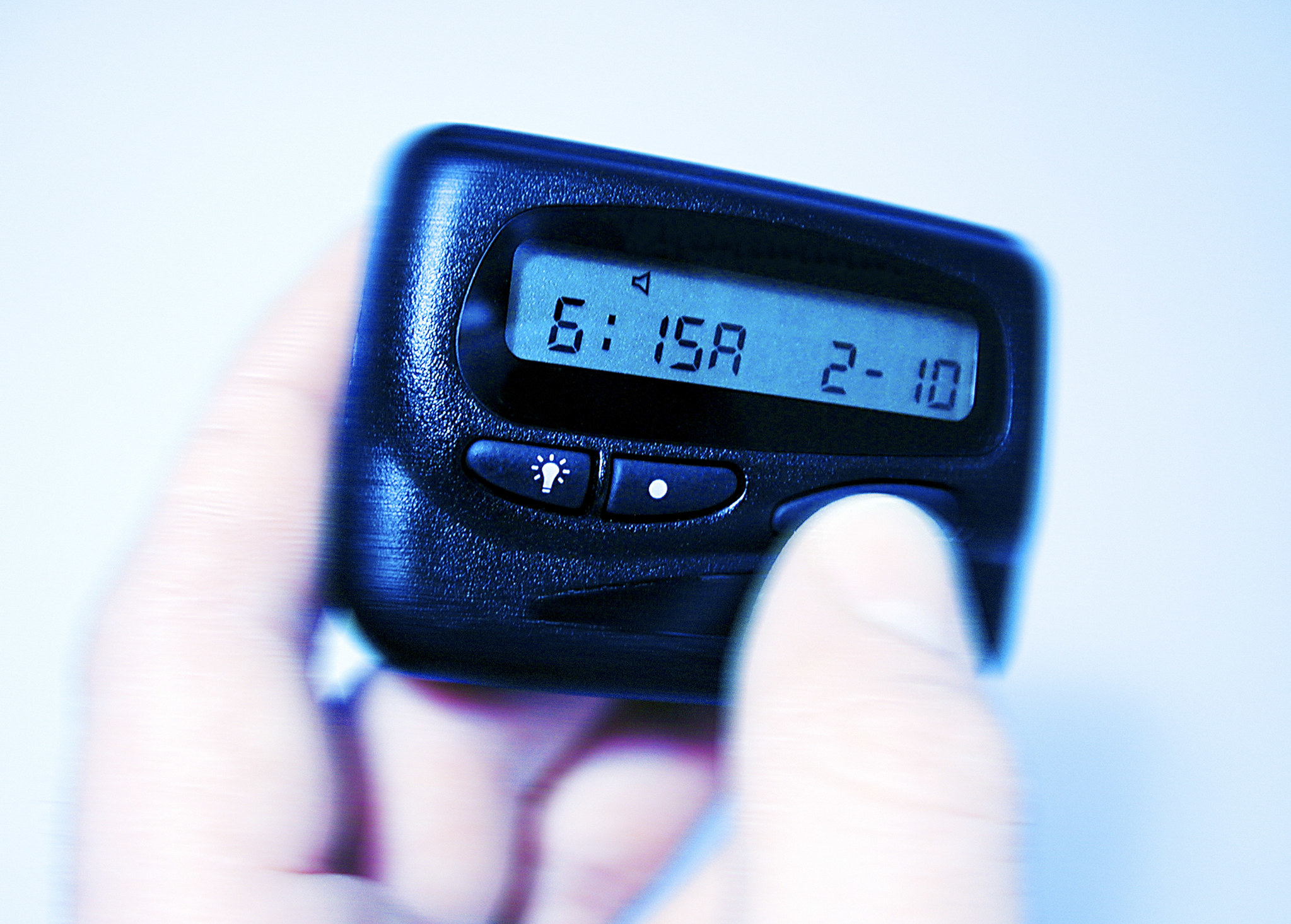 Close-up of a pager in someone&#x27;s hand