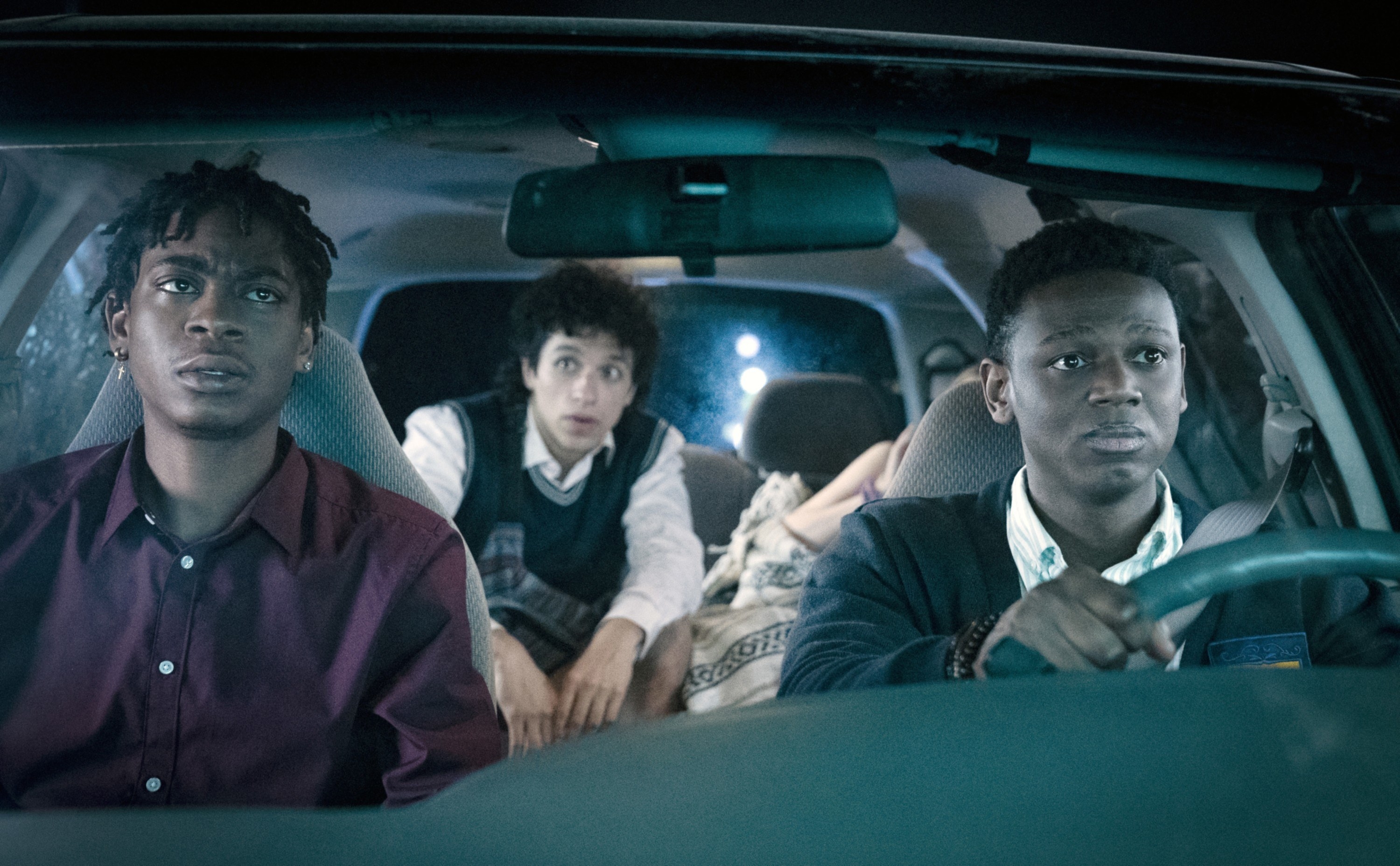 RJ Cyler, Sebastian Chacon, and Donald Elise Watkins drive in a car