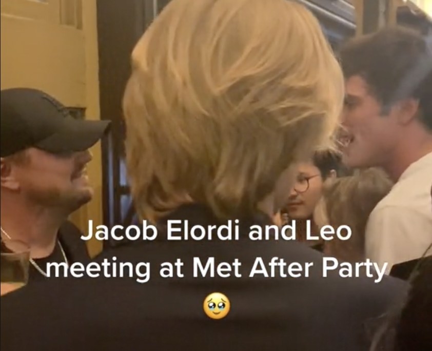 A screenshot of Leo and Jacob looking at each other while chatting with a few people between them