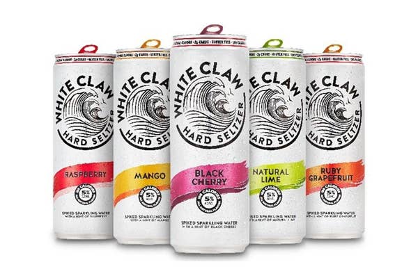 Cans of white claw hard seltzer in a variety of flavors