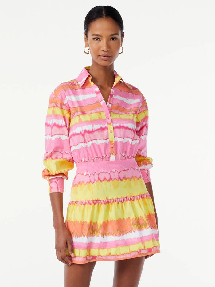 Model wearing the pink multi tie dye stripe dress