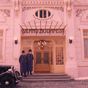 Zero running into the Grand Budapest Hotel