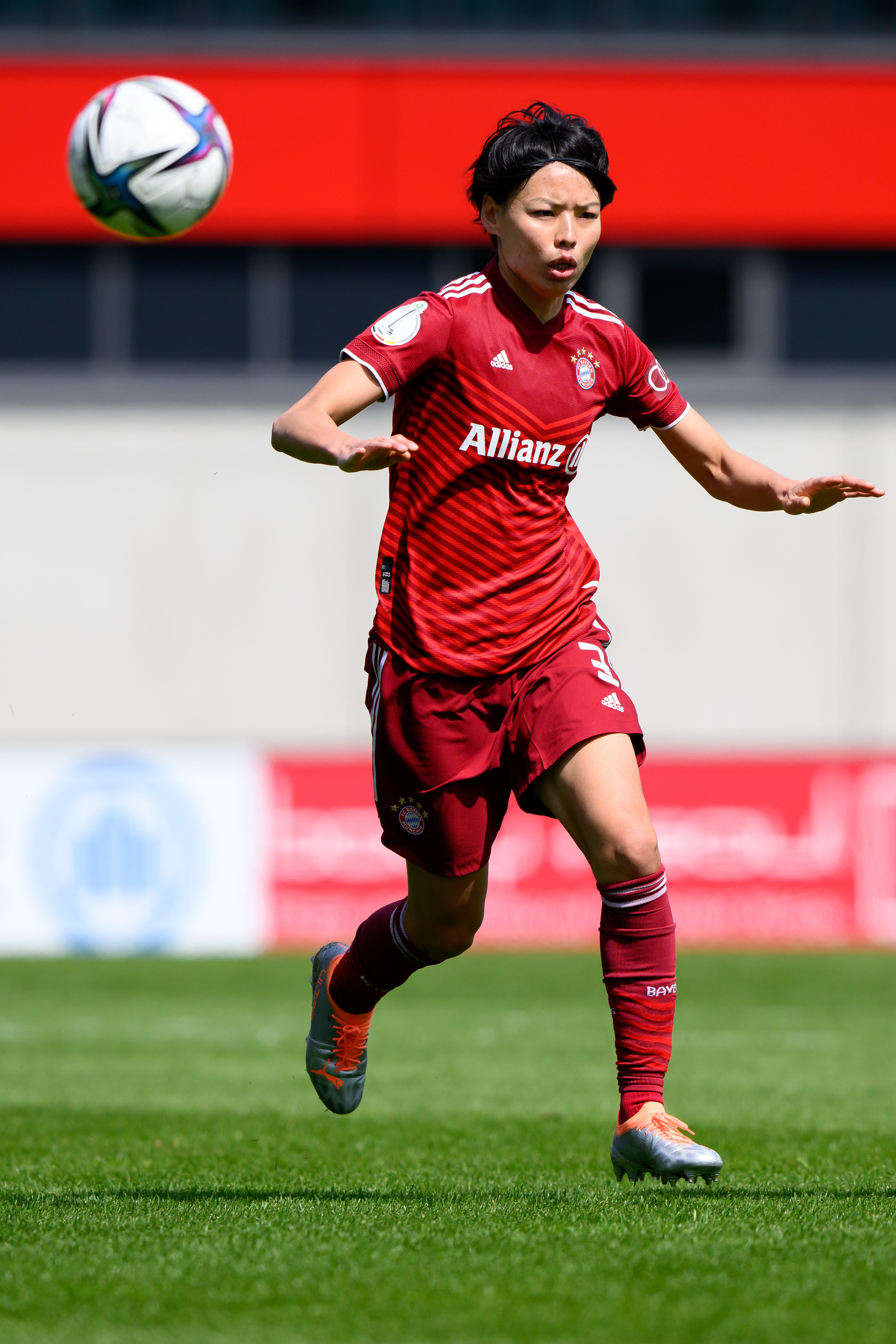 Saki Kumagai playing soccer