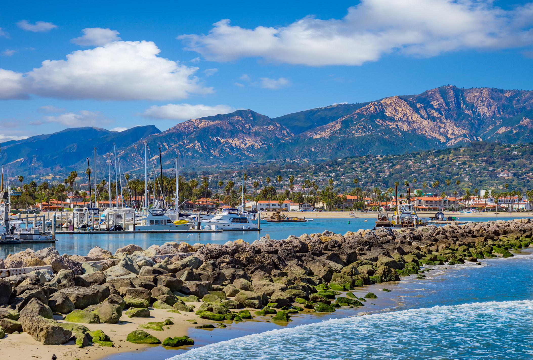 A beautiful marina in Santa Barbara, with the ocean and mountains clearly visible