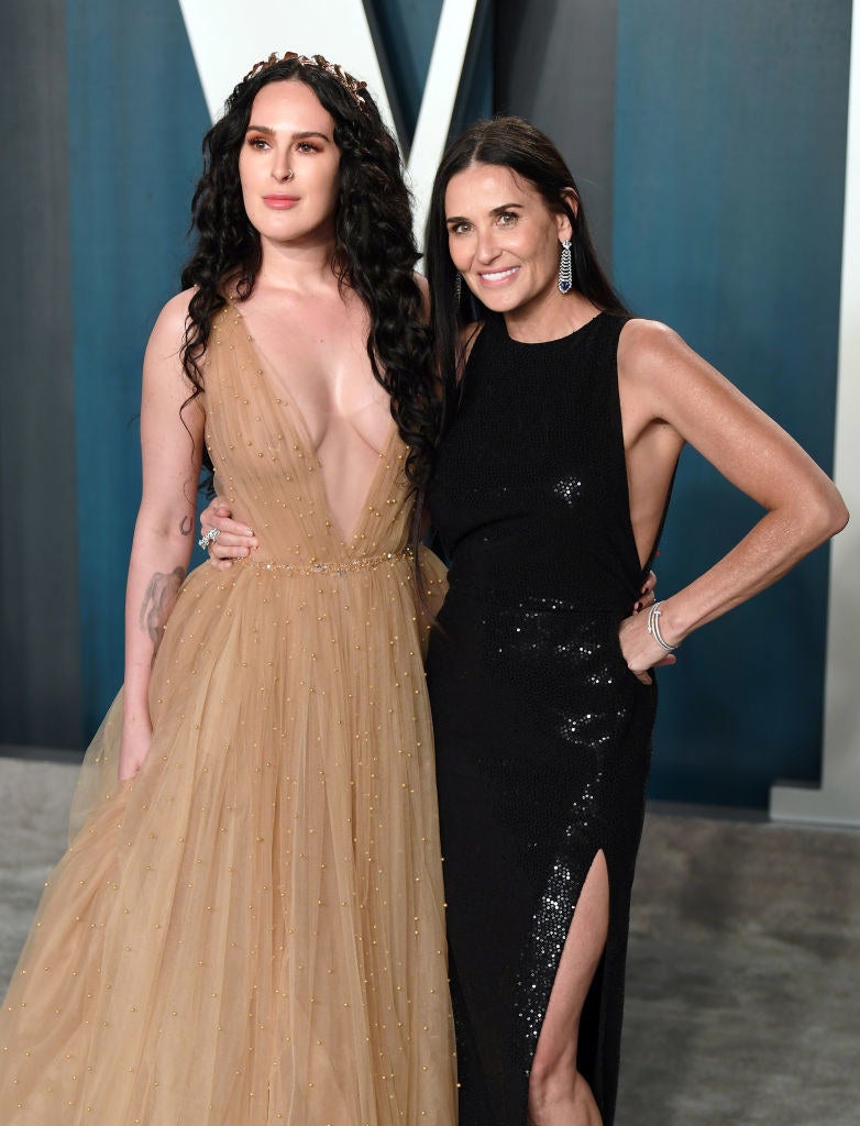 the two posing at an event