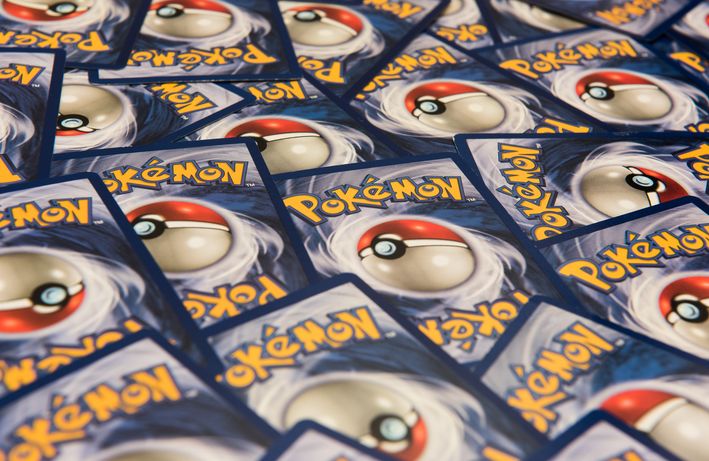 New York City, NY, USA — July 12, 2016: Pokemon trading cards background. Illustrative Editorial