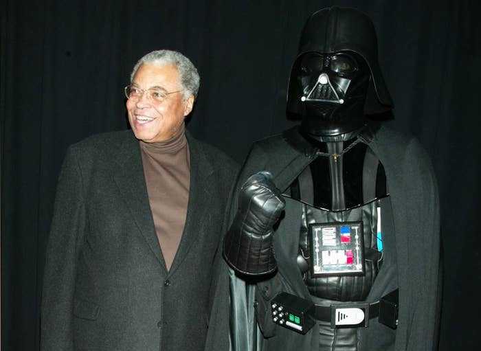 James poses with someone in a Darth Vader outfit