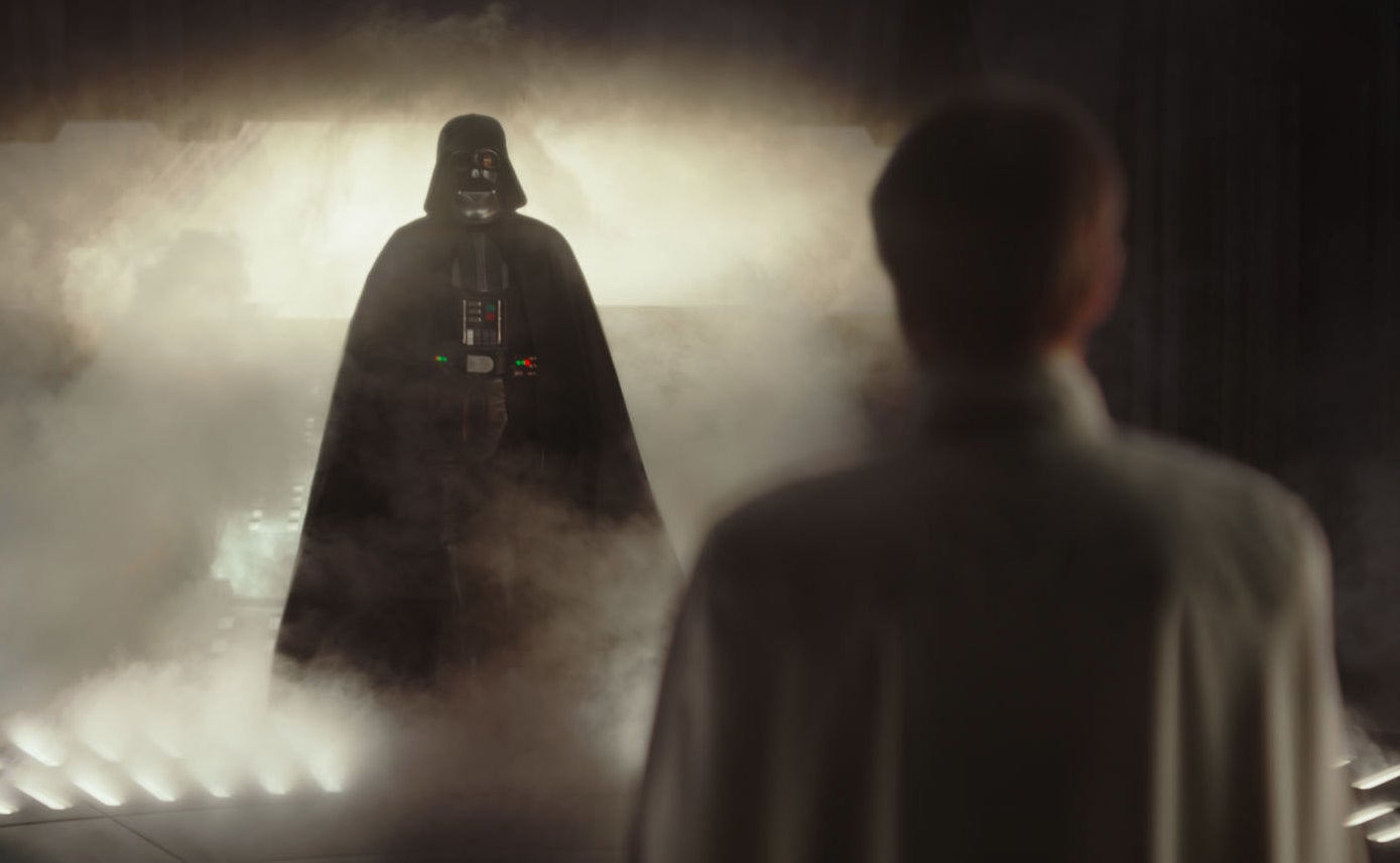 Darth Vader enters a room in a cloud of smoke