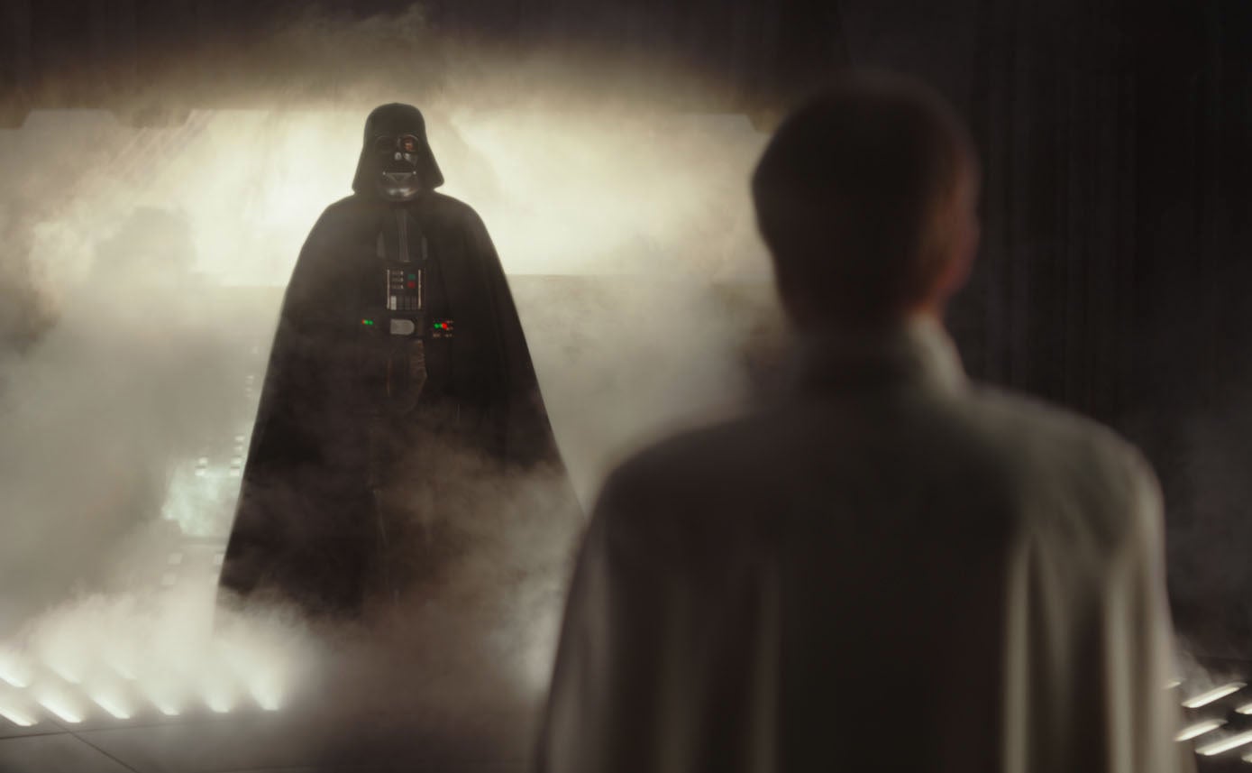 Darth Vader enters a room in a cloud of smoke