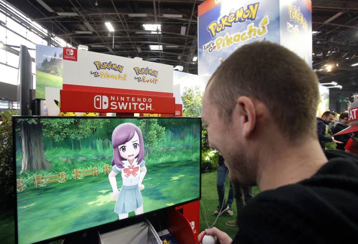 A Gamer plays the video game &#x27;Pokemon Let&#x27;s Go&#x27; developed by Pokemon Company on a Nintendo Switch