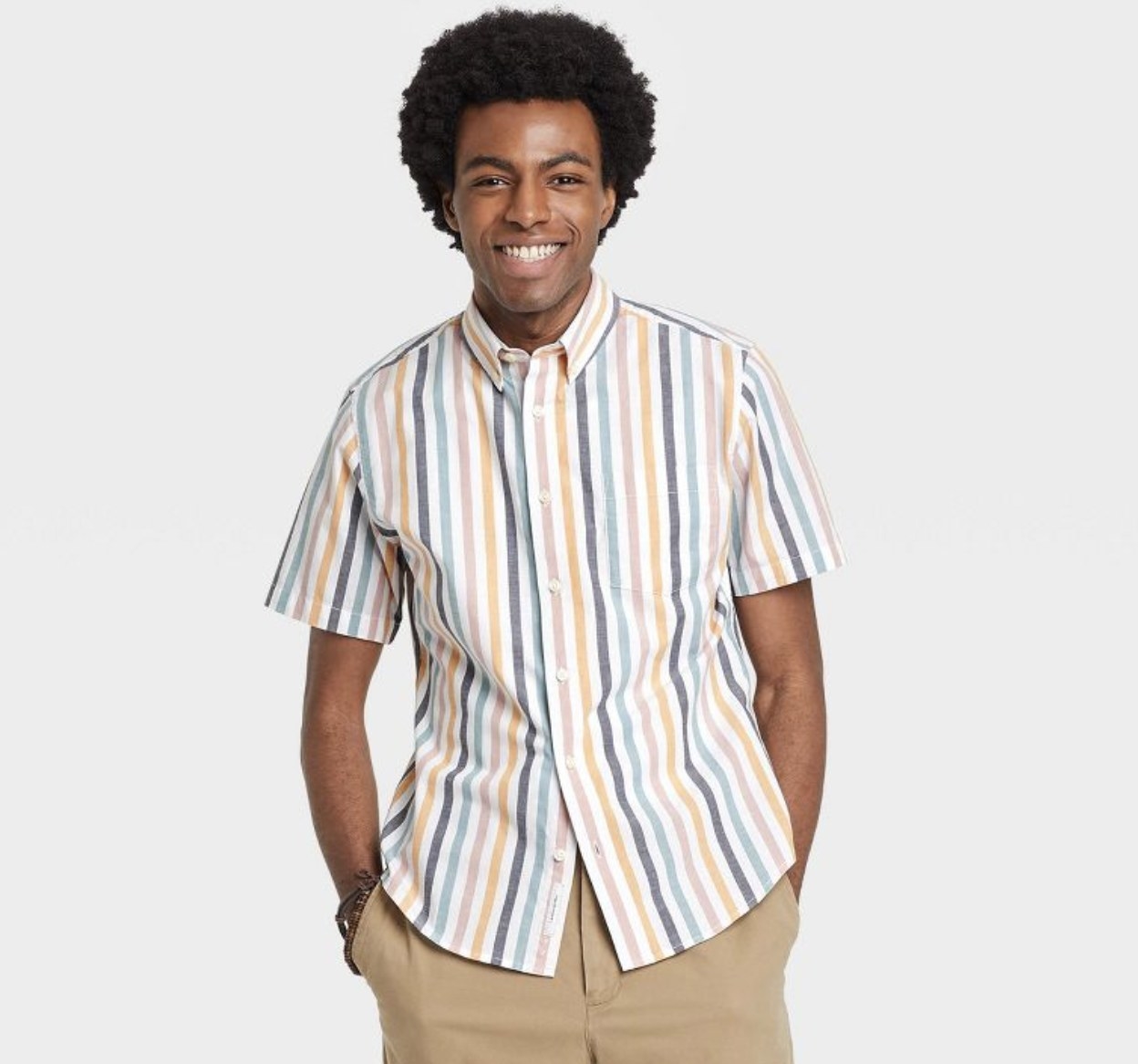 model wearing striped button down shirt