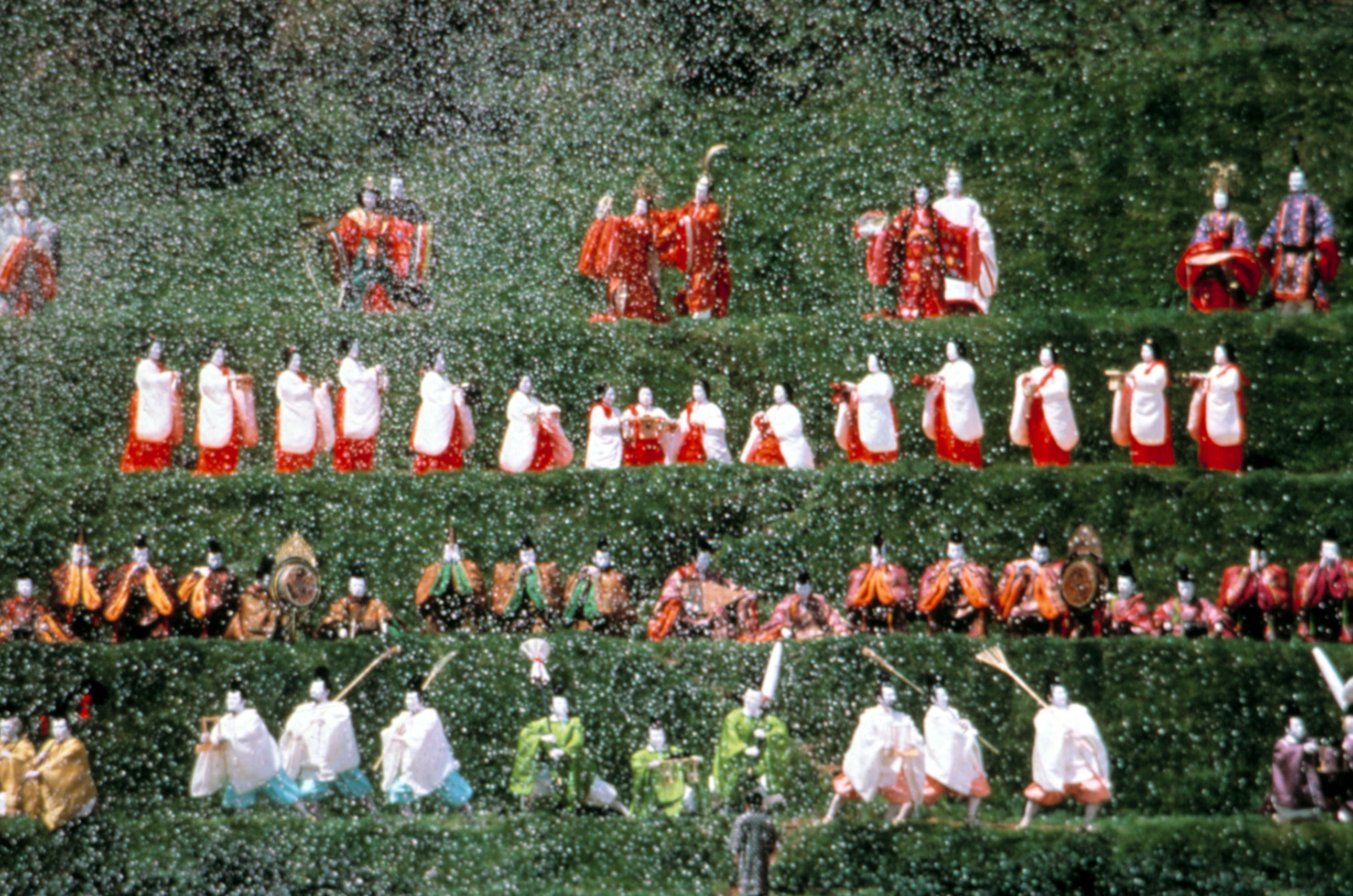 four rows of people in traditional Chinese dress
