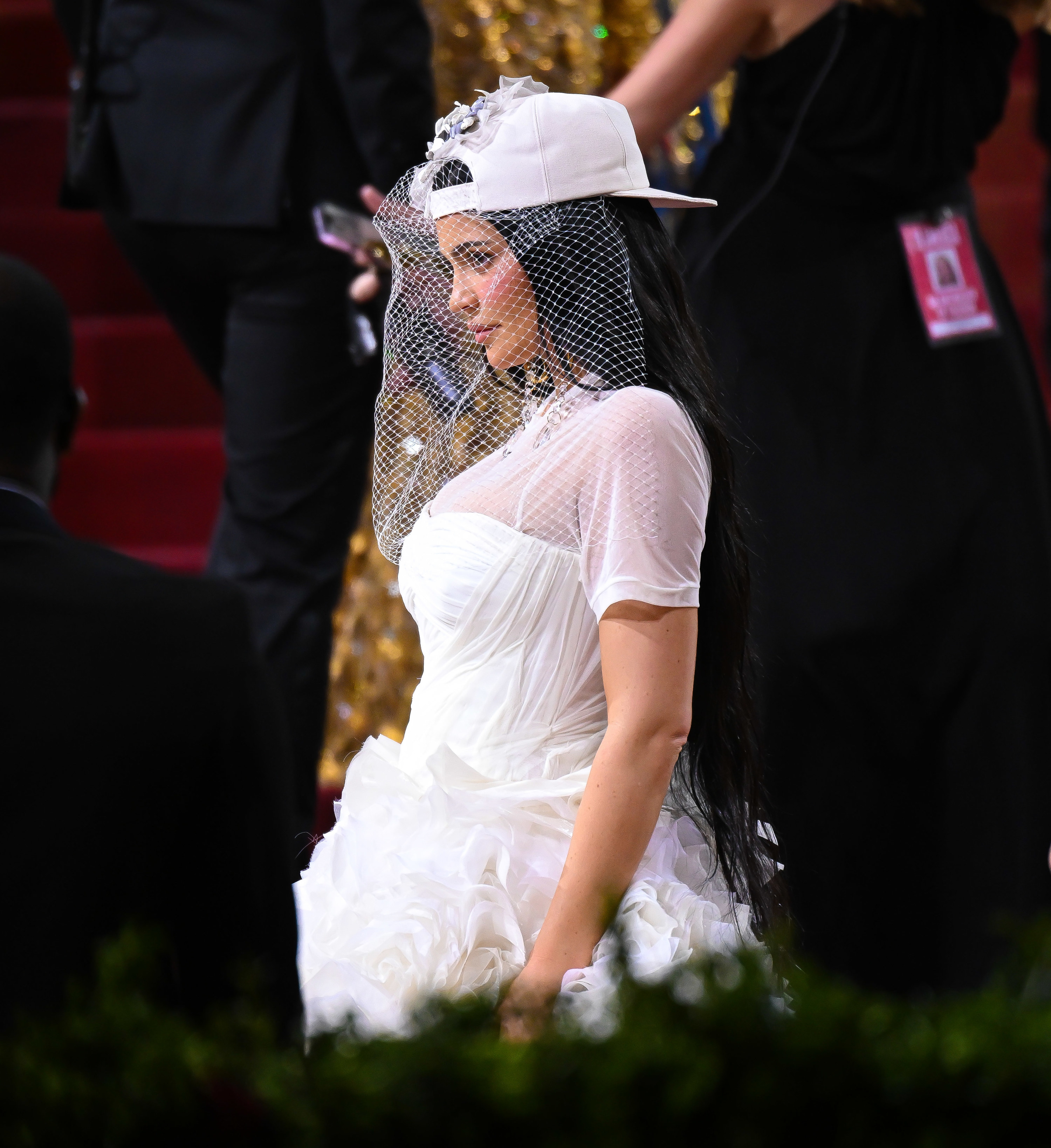 A side view of Kylie posing for photos in her Met Gala outfit