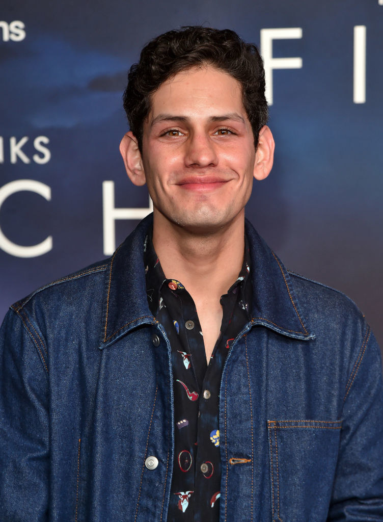 Smiling Matt in a jean jacket and shirt