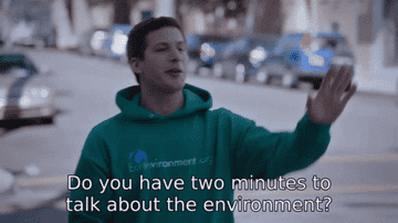 Andy Samberg as Jake Peralta in &quot;Brooklyn 99&quot;, waving down a stranger and asking, &quot;Do you have two minutes to talk about the environment&quot;