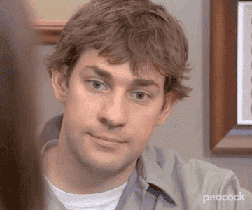 John Krasinski as Jim Halpert widens his eyes and closes his mouth in &quot;The Office&quot;