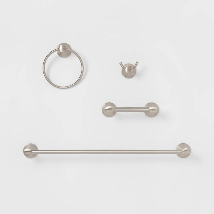 A closeup of the four-piece set in brushed nickel