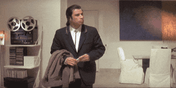John Travolta as Vincent looks around confused