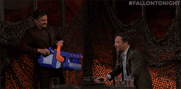 Jimmy Fallon getting soaked from a super soaker gun