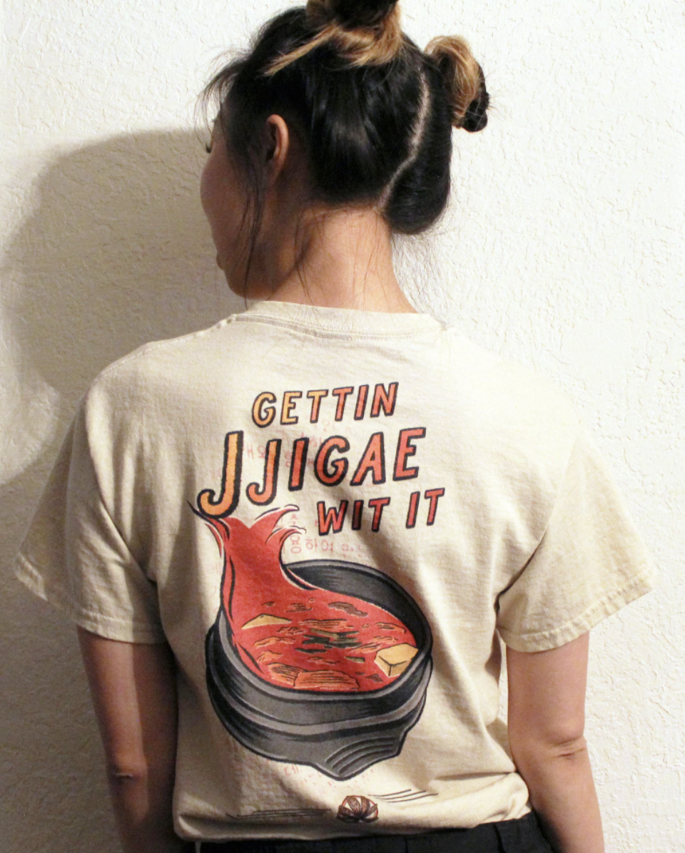 Back shot of a model wearing the kimchi jjigae shirt.
