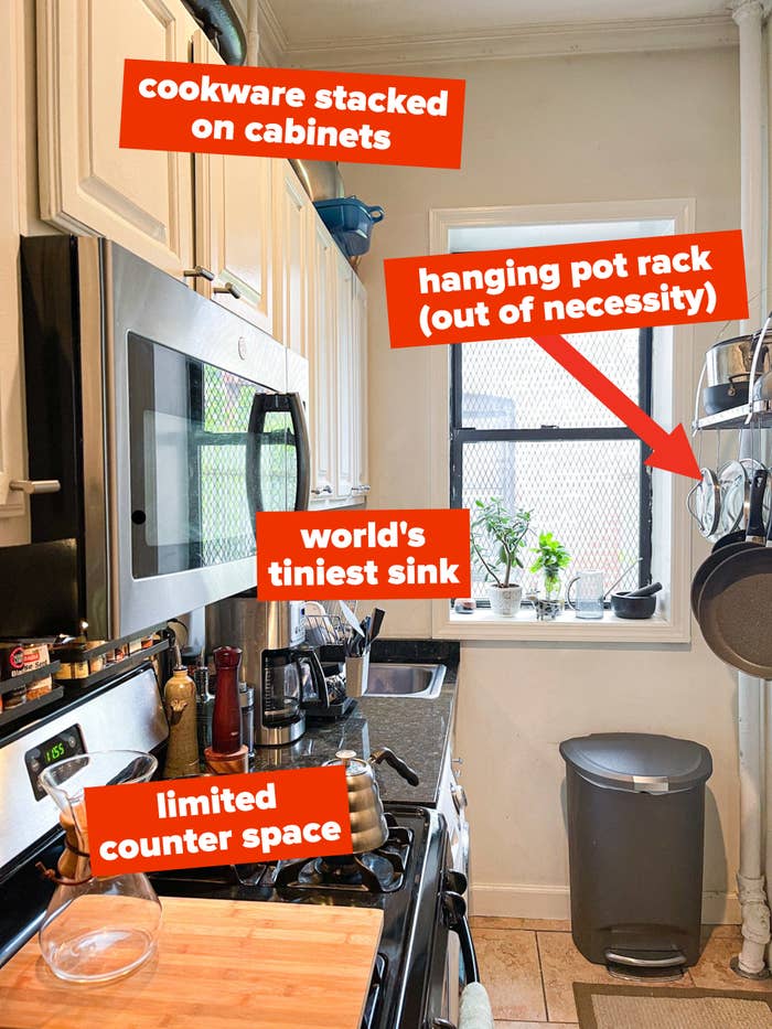 photo of author&#x27;s kitchen with cookware stacked on cabinets, small sink, and limited counter space