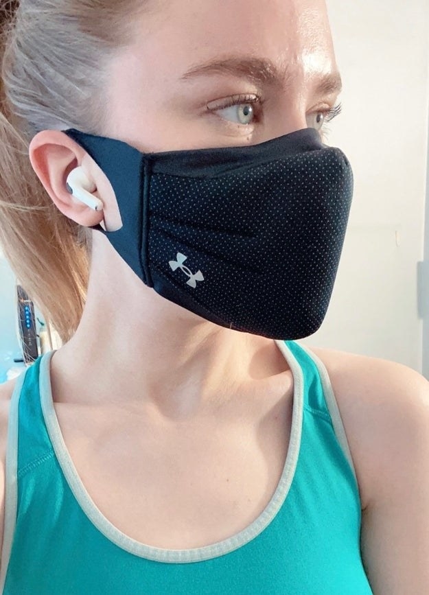 BuzzFeed editor in workout gear wearing AirPods Pro in ears