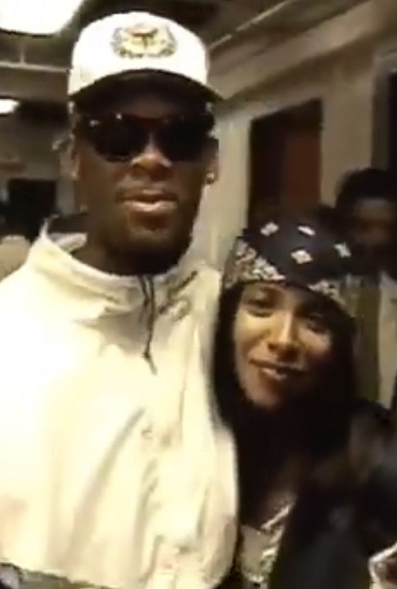 Image from video of R Kelly embracing Aaliyah