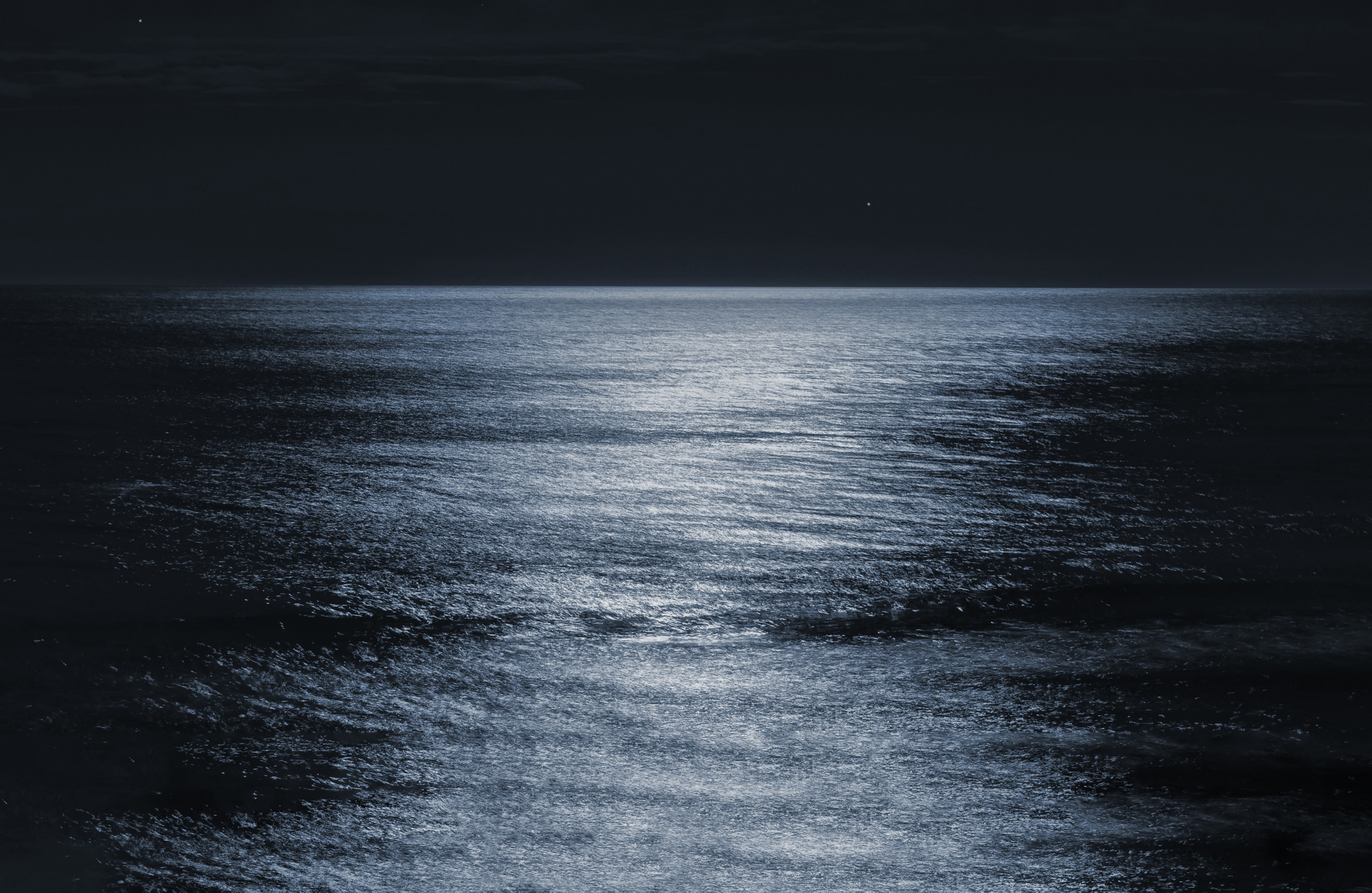 the still ocean water at night